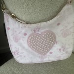 Stony Clover Lane climbing roses curved cross body bag